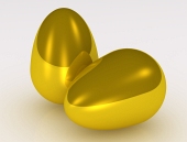 Two golden eggs on white background