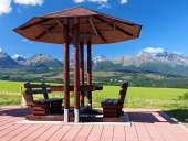 Benches under shelter and High Tatras
