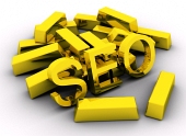 Lingotes de oro y letras de optimización de motores de búsqueda (SEO)