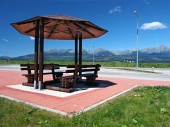 Shelter with benches and High Tatras