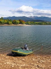 Fishing boat at Liptovska Mara during autumn